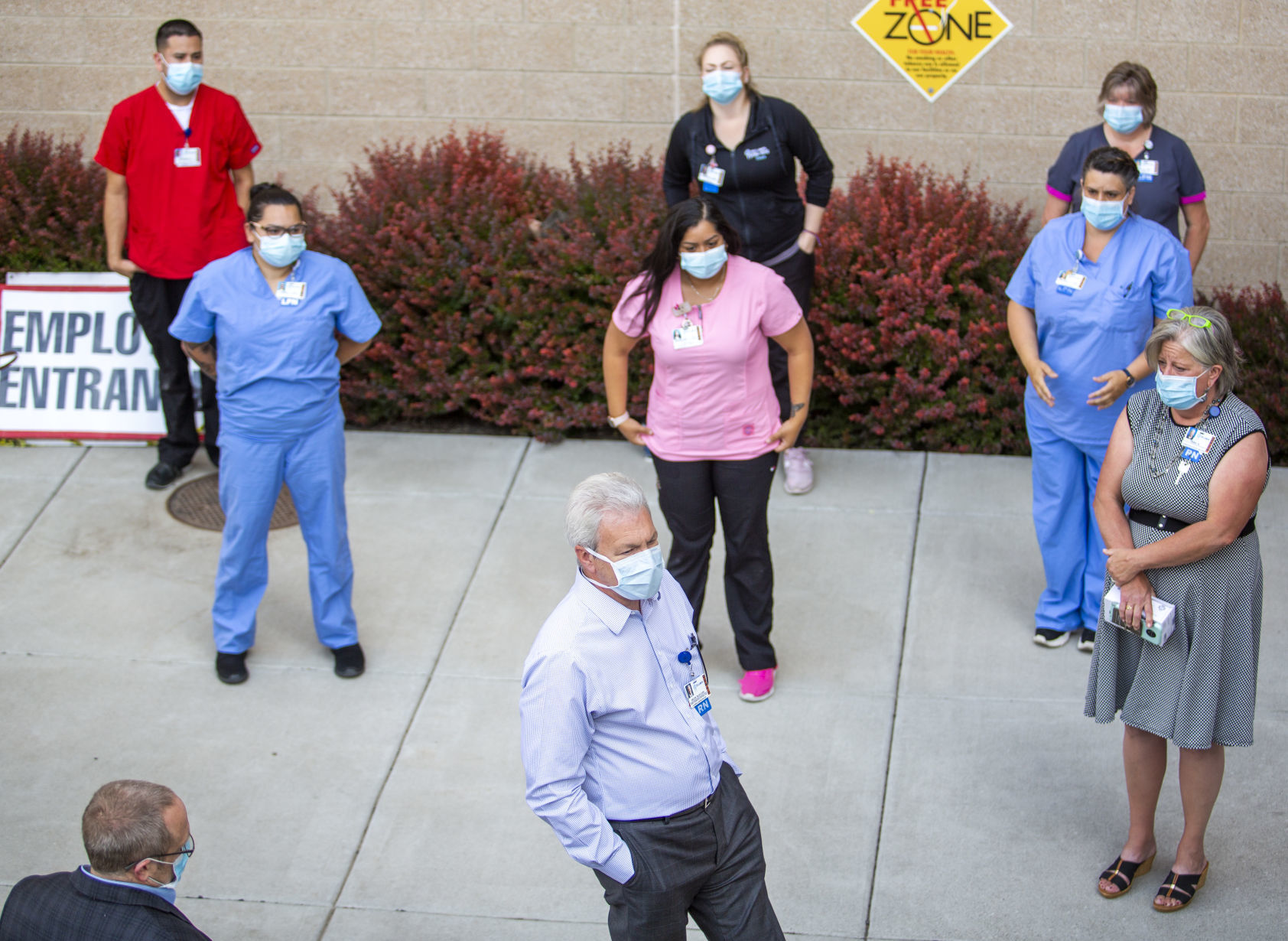 Hospital staff show solidarity with moment of silence